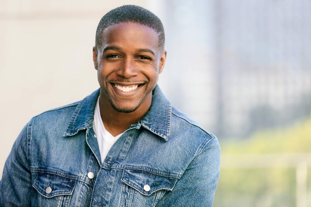 Man smiling after cosmetic dentistry in Beachwood OH