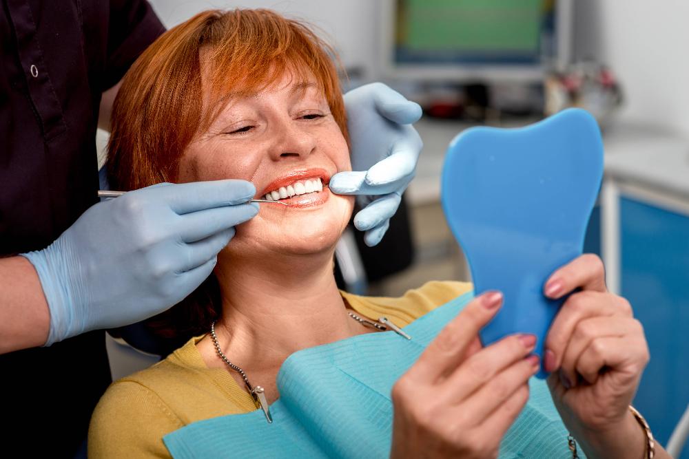 A lady undergoing a denture session in Beachwood, OH.