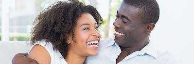 Couple laughing after cosmetic dentistry in Beachwood, OH