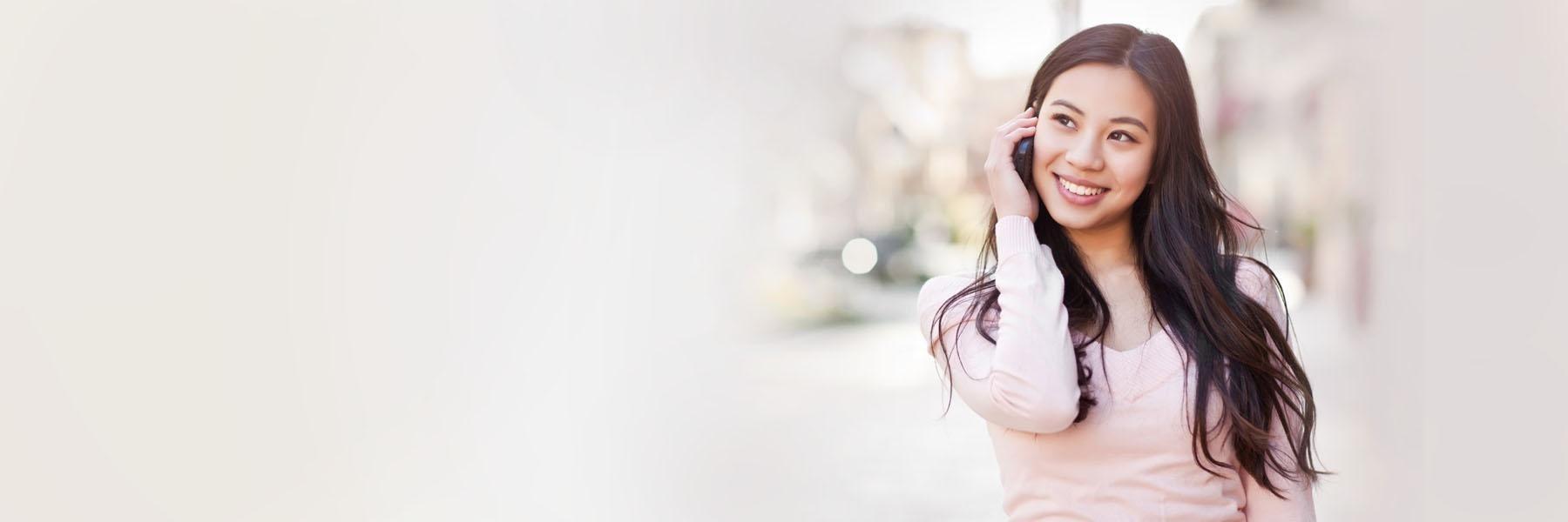 Woman smiling after dental cleaning in Beachwood, OH