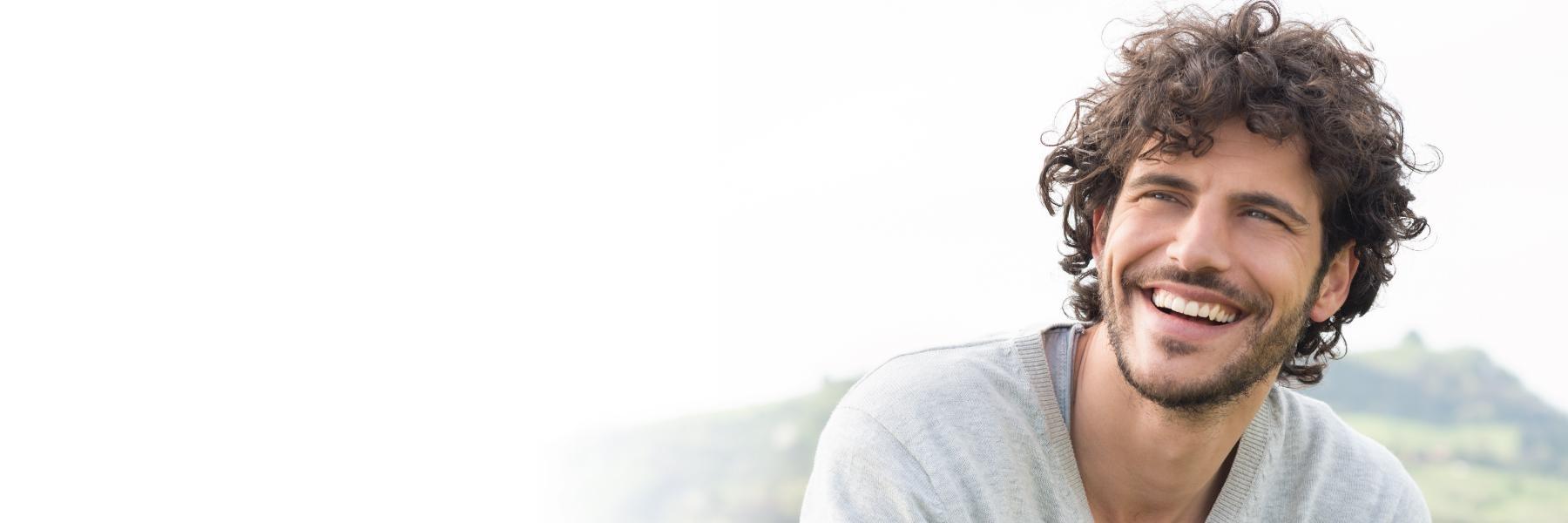 Man smiling after cosmetic dentistry in Beachwood, OH