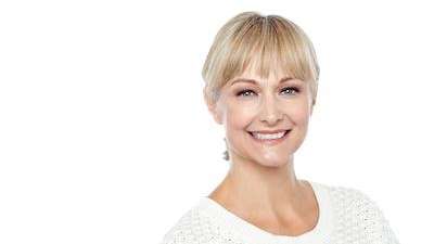 A lady smiling after undergoing Botox in Beachwood, OH.