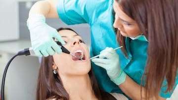A Lady Undergoing Dental Treatment in Beachwood, OH.