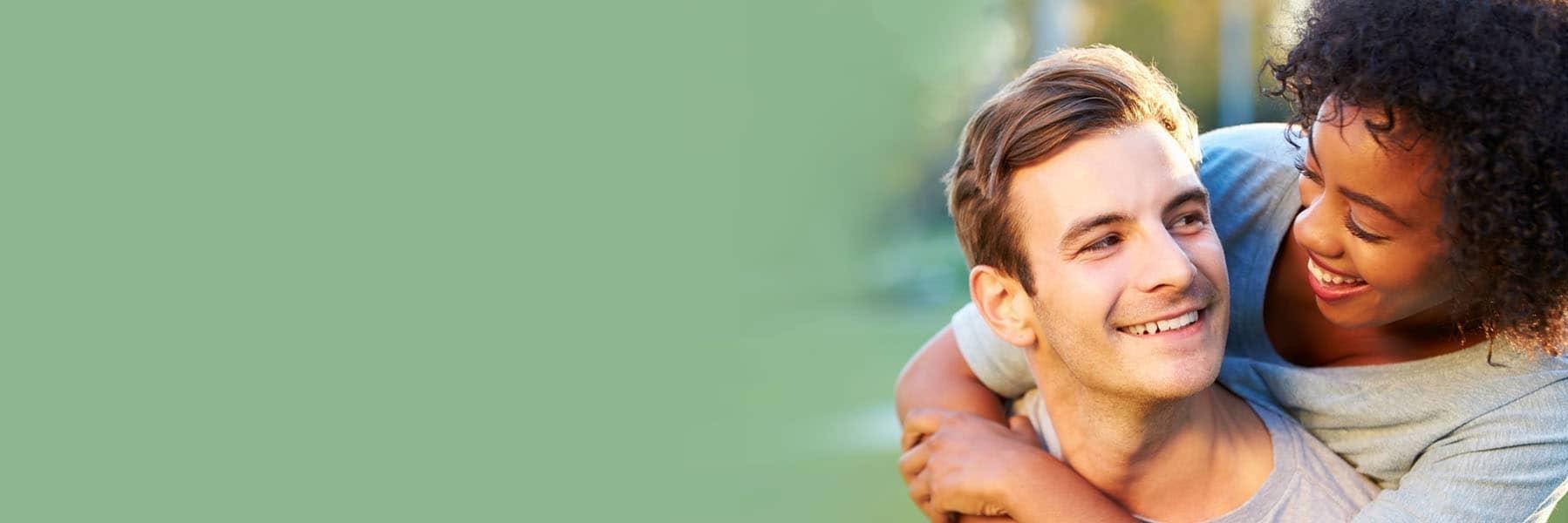 Couple smiling after cosmetic dentistry in Beachwood, OH