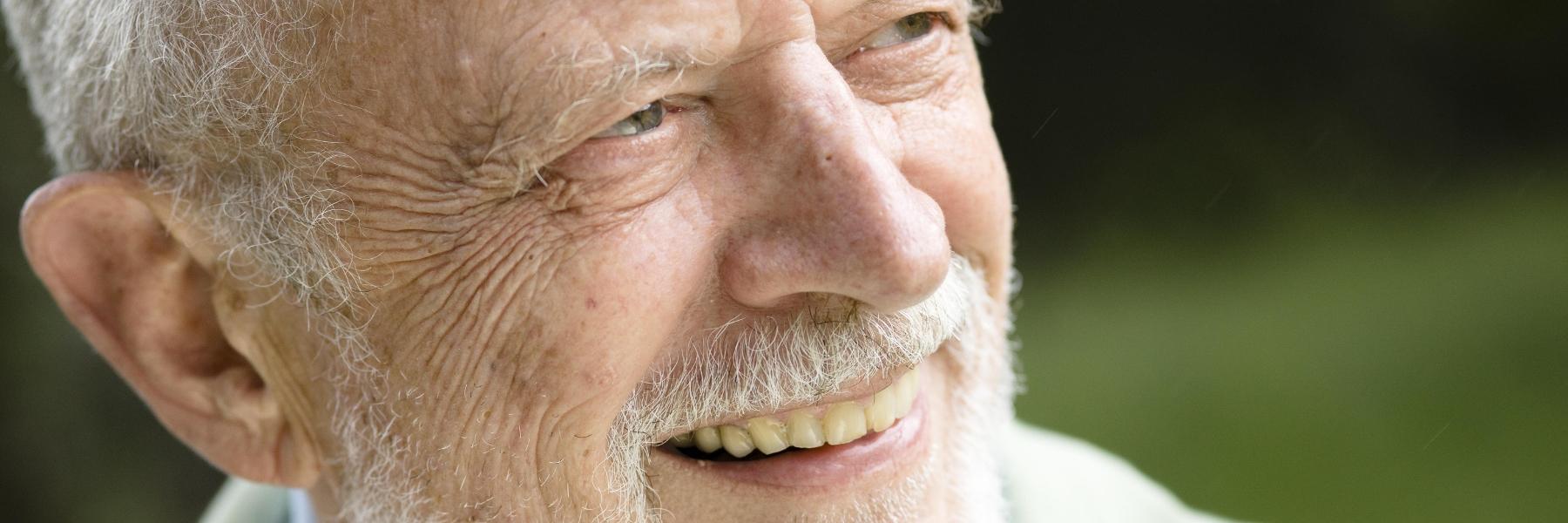 Man smiling after getting dental implants in Beachwood, OH